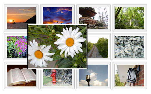 div css布局图像画廊A标签属性鼠标滑过显示大图片(图1)